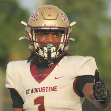 St. Augustine wide receiver Somourian Wingo (1) responds to a signal from the sideline with a thumbs-up against Bishop Kenny during a high school spring football game on May 21, 2025. [Clayton Freeman/Florida Times-Union]