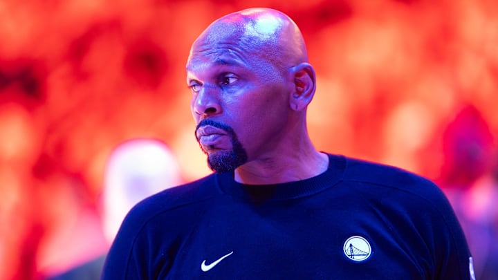 Feb 5, 2026; Phoenix, Arizona, USA; Golden State Warriors assistant coach Jerry Stackhouse against the Phoenix Suns at Mortgage Matchup Center. Mandatory Credit: Mark J. Rebilas-Imagn Images