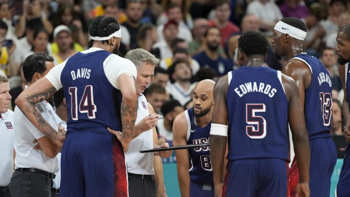 Jul 28, 2024; Villeneuve-d'Ascq, France; United States head coach Steve Kerr talks to the team during a timeout  in the first quarter against Serbia during the Paris 2024 Olympic Summer Games at Stade Pierre-Mauroy. Mandatory Credit: John David Mercer-USA TODAY Sports