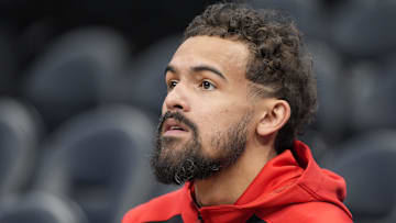 Trae Young #11 of the Atlanta Hawks looks on before facing the Charlotte Hornets.