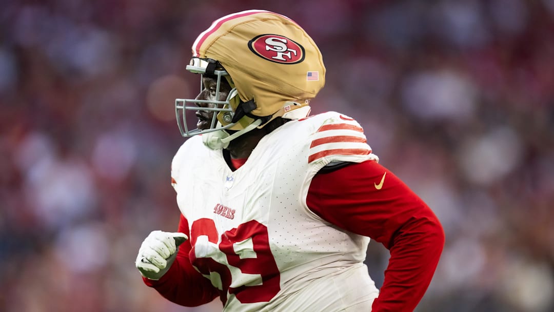 Jan 5, 2025; Glendale, Arizona, USA; San Francisco 49ers defensive tackle Evan Anderson (69) wears a guardian cap on his helmet against the Arizona Cardinals at State Farm Stadium. Mandatory Credit: Mark J. Rebilas-Imagn Images