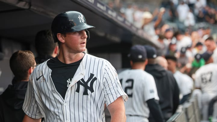 Aug 4, 2024; Bronx, New York, USA; New York Yankees third baseman DJ LeMahieu (26) looks back from the dugout after defeating the Toronto Blue Jays at Yankee Stadium. Mandatory Credit: Vincent Carchietta-USA TODAY Sports