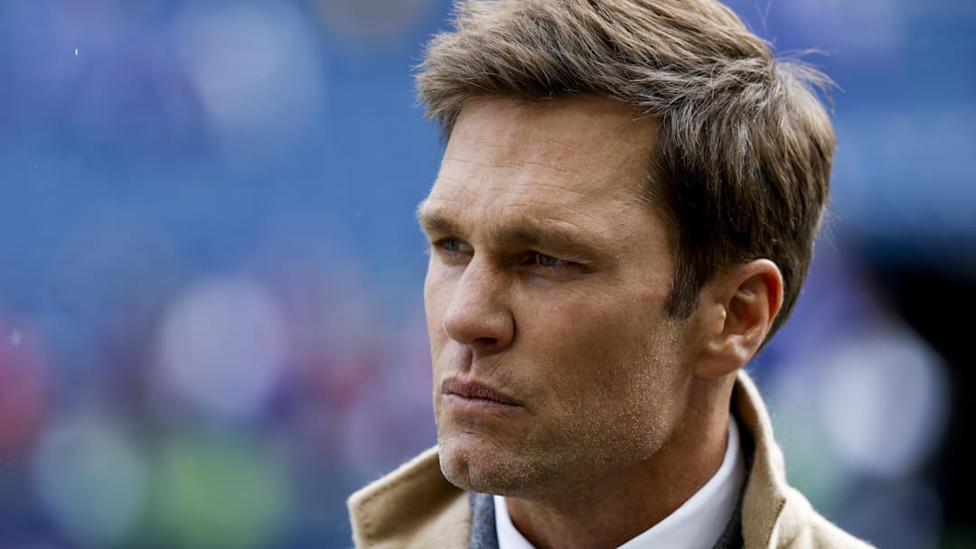 Oct 27, 2024; Seattle, Washington, USA; FOX commentator Tom Brady stands on the sideline before a game between the Seattle Seahawks and Buffalo Bills at Lumen Field. Mandatory Credit: Joe Nicholson-Imagn Images