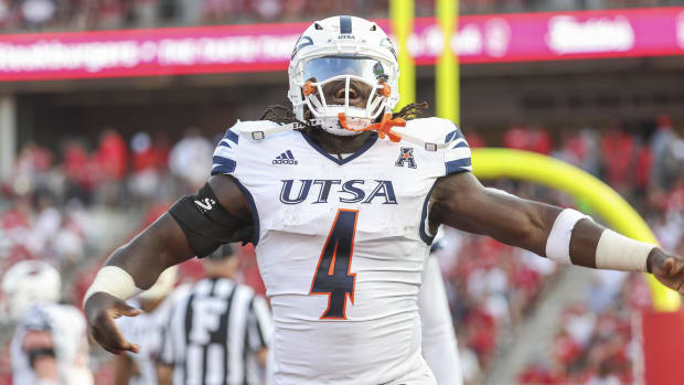 Sep 2, 2023; Houston, Texas, USA; UTSA Roadrunners running back Kevorian Barnes (4) celebrates after scoring a touchdown during the first quarter against the Houston Cougars at TDECU Stadium. Mandatory Credit: Troy Taormina-USA TODAY Sports