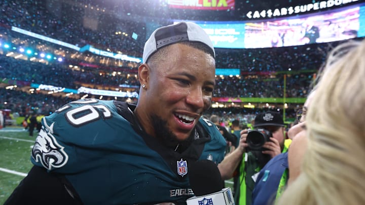 Philadelphia Eagles running back Saquon Barkley (26) is interviewed on field after defeating the Kansas City Chiefs in Super Bowl LIX at Ceasars Superdome.
