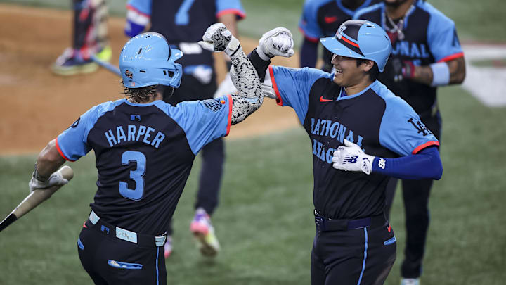 National League designated hitter Shohei Ohtani of the Los Angeles Dodgers celebrates a three run home run with Bryce Harper of the Philadelphia Phillies National League designated hitter Shohei Ohtani of the Los Angeles Dodgers celebrates a three run home run with Bryce Harper of the Philadelphia Phillies