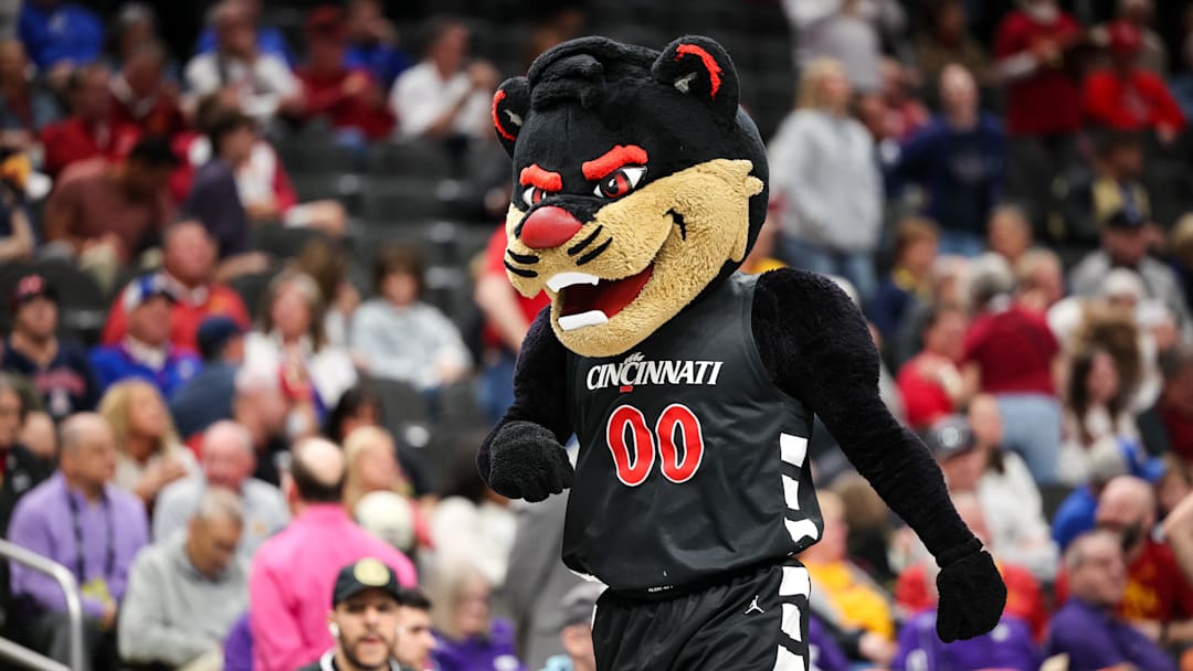 Mar 12, 2025; Kansas City, MO, USA; Cincinnati Bearcats mascot on the court during the first half against the Iowa State Cyclones at T-Mobile Center. Mandatory Credit: William Purnell-Imagn Images