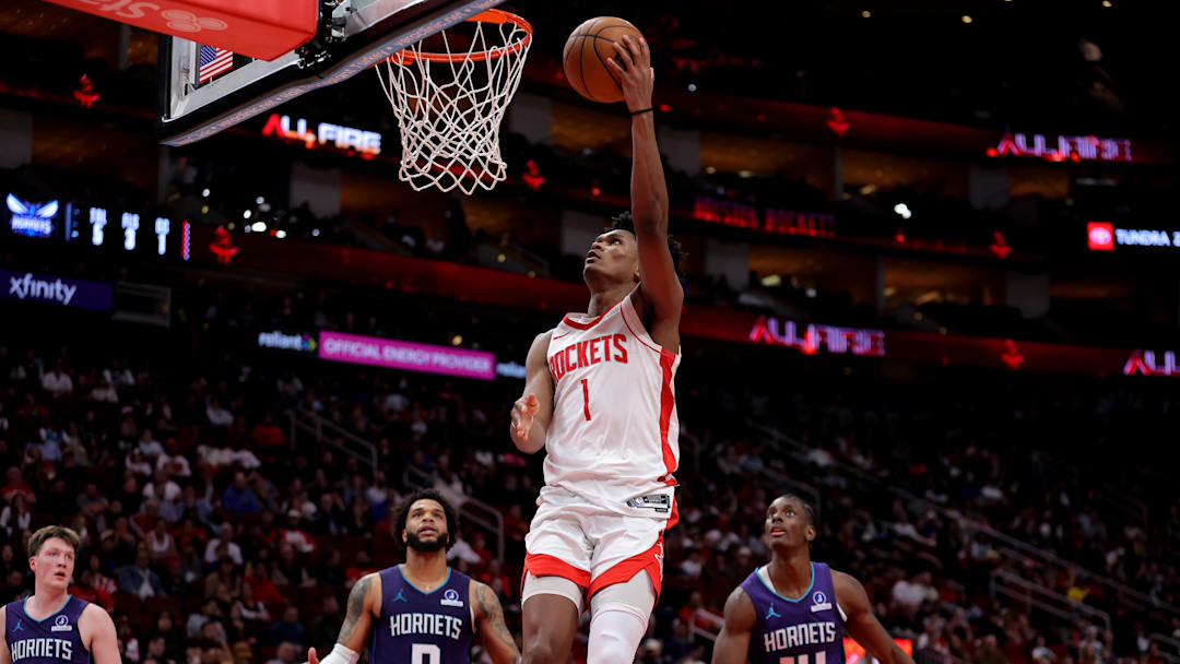 Feb 5, 2026; Houston, Texas, USA; Houston Rockets guard Amen Thompson (1) shoots against the Charlotte Hornets during the third quarter at Toyota Center. Mandatory Credit: Erik Williams-Imagn Images