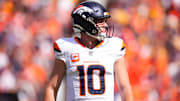 Sep 15, 2024; Denver, Colorado, USA; Denver Broncos quarterback Bo Nix (10) during the first quarter against the Pittsburgh Steelers at Empower Field at Mile High. 