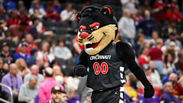 Mar 12, 2025; Kansas City, MO, USA; Cincinnati Bearcats mascot on the court during the first half against the Iowa State Cyclones at T-Mobile Center. Mandatory Credit: William Purnell-Imagn Images