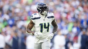 Dec 8, 2024; Glendale, Arizona, USA; Seattle Seahawks wide receiver DK Metcalf (14) against the Arizona Cardinals at State Farm Stadium. Mandatory Credit: Mark J. Rebilas-Imagn Images