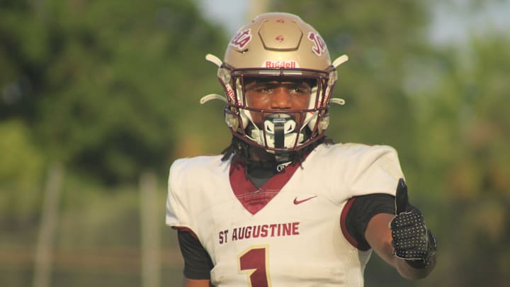 St. Augustine wide receiver Somourian Wingo (1) responds to a signal from the sideline with a thumbs-up against Bishop Kenny during a high school spring football game on May 21, 2025. [Clayton Freeman/Florida Times-Union]
