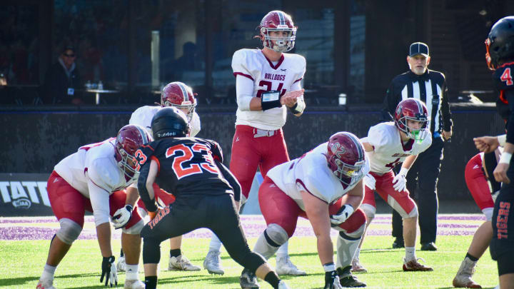 Carter Kuchenbuch led Okanogan to WIAA Class 2B football championships last fall over Napavine in Seattle.