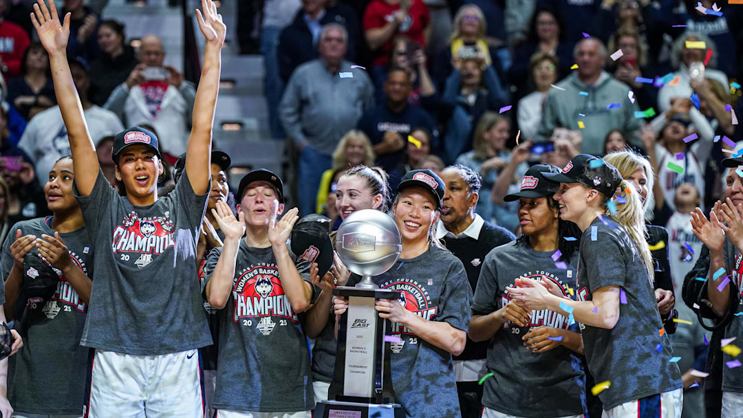Mar 10, 2025; Uncasville, CT, USA; The UConn Huskies celebrate their Big East Championship win over the Creighton Bluejays at Mohegan Sun Arena. Mandatory Credit: David Butler II-Imagn Images