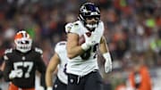 Nov 16, 2025; Cleveland, Ohio, USA; Baltimore Ravens tight end Mark Andrews (89) runs for a touchdown during the fourth quarter against the Cleveland Browns at Huntington Bank Field. Mandatory Credit: Scott Galvin-Imagn Images