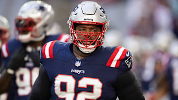 Dec 15, 2024; Glendale, Arizona, USA; New England Patriots defensive tackle Davon Godchaux (92) against the Arizona Cardinals at State Farm Stadium. Mandatory Credit: Mark J. Rebilas-Imagn Images