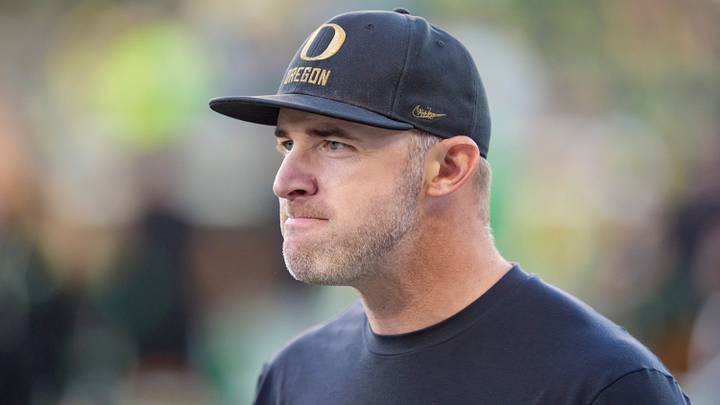 Oregon offensive coordinator Drew Mehringer walks the field before the game as the Oregon Ducks host the Portland State Vikings on Sept. 18, 2026, at Autzen Stadium in Eugene, Oregon.