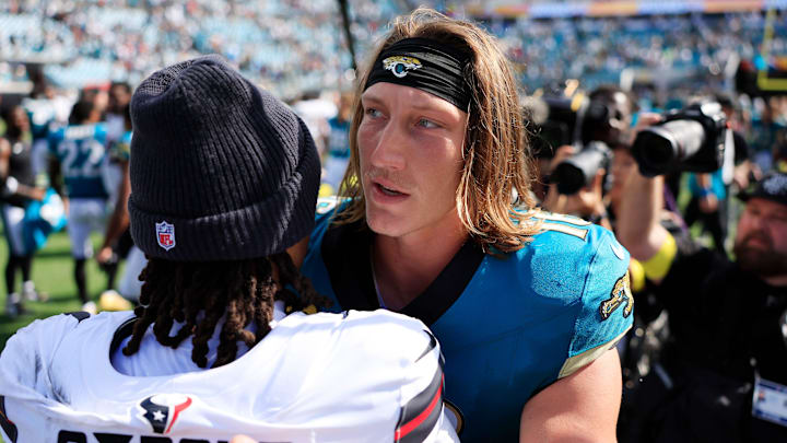 Jacksonville Jaguars quarterback Trevor Lawrence (16) greets Houston Texans quarterback CJ. Stroud (7) mid-field after the game of an NFL football matchup at EverBank Stadium, Sunday, Sept. 21, 2025, in Jacksonville, Fla. The Jaguars defeated the Texans 17-10.
