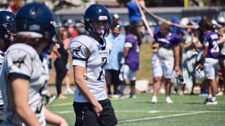 Arlington quarterback Leyton Martin participates at the PLU 11v11 Football Showcase on Wednesday in Parkland.