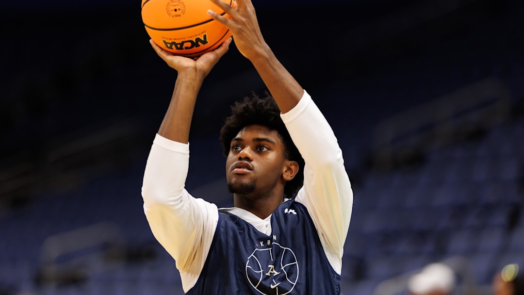 Mar 19, 2026; Tampa, FL, USA; Akron Zips guard Eric Mahaffey (4) shoots the ball during a practice session ahead of the first round of the men's 2026 NCAA Tournament at Benchmark International Arena. Mandatory Credit: Matt Pendleton-Imagn Images