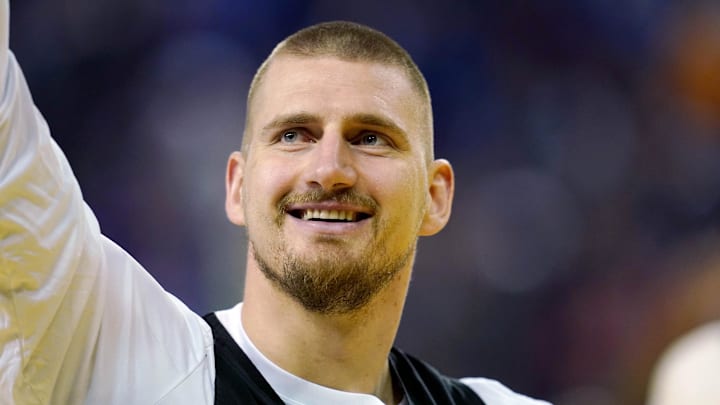 Feb 15, 2025; Oakland, CA, USA; Chuck’s Global Stars center Nikola Jokic (15) of the Denver Nuggets waves to the crowd during the NBA All Star-Practice at Oracle Arena. Mandatory Credit: Cary Edmondson-Imagn Images