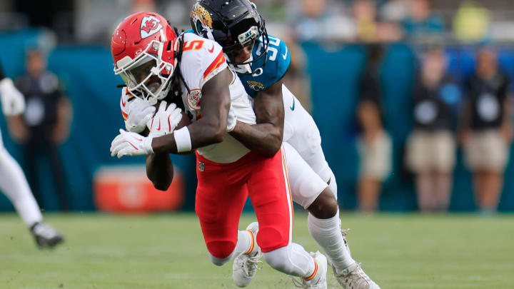 Jacksonville Jaguars cornerback Montaric Brown (30) tackles Kansas City Chiefs wide receiver Hollywood Brown (5) during the first quarter of a preseason NFL football game Saturday, Aug. 10, 2024 at EverBank Stadium in Jacksonville, Fla. [Corey Perrine/Florida Times-Union]