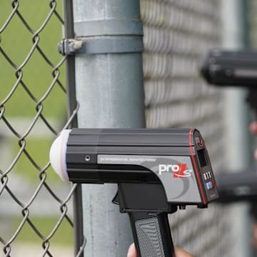Scouts line up to get radar readings with radar guns