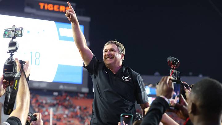 Oct 11, 2025; Auburn, Alabama, USA;  Georgia Bulldogs head coach Kirby Smart celebrates after the Bulldogs beat the Auburn Tigers at Jordan-Hare Stadium. Mandatory Credit: John Reed-Imagn Images