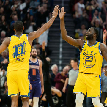 Dec 27, 2019; San Francisco, California, USA;  Golden State Warriors guard Alec Burks (8) and Golden State Warriors forward Draymond Green (23) celebrate after the score against the Phoenix Suns during the fourth quarter at Chase Center. Mandatory Credit: Neville E. Guard-USA TODAY Sports
