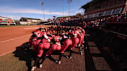Nebraska softball players gather before a game against Northern Iowa at Bowlin Stadium on March 9, 2025.