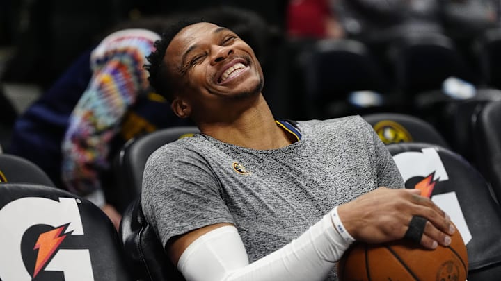 Mar 15, 2025; Denver, Colorado, USA; Denver Nuggets guard Russell Westbrook (4) reacts before the game against the Washington Wizards at Ball Arena. Mandatory Credit: Ron Chenoy-Imagn Images