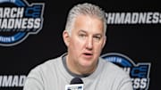 Purdue Boilermakers head coach Matt Painter talks to the media during practice 