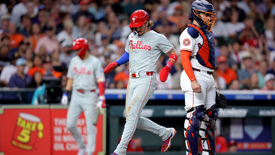 Philadelphia Phillies second baseman Bryson Stott crosses home plate to score a run against the Houston Astros | Erik Williams-Imagn Images