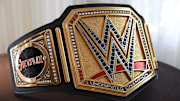 A custom WWE Championship with a Netflix sideplate.