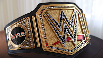 A custom WWE Championship with a Netflix sideplate.