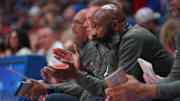 Kansas Jayhawks assistant coach Jacque Vaughn watches players during the second half of the exhibition game against Fort Hays State Tigers inside Allen Fieldhouse on Tuesday, October, 28, 2025.