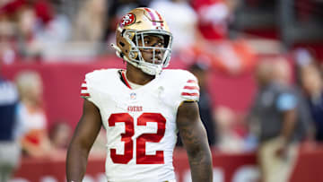 Jan 5, 2025; Glendale, Arizona, USA; San Francisco 49ers running back Patrick Taylor Jr. (32) against the Arizona Cardinals at State Farm Stadium. Mandatory Credit: Mark J. Rebilas-Imagn Images