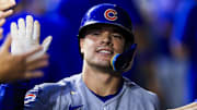 Sep 19, 2025; Cincinnati, Ohio, USA; Chicago Cubs third baseman Matt Shaw (6) high fives teammates after hitting a two-run home run in the fourth inning against the Cincinnati Reds at Great American Ball Park. 