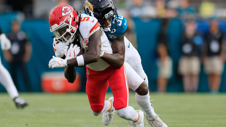 Jacksonville Jaguars cornerback Montaric Brown (30) tackles Kansas City Chiefs wide receiver Hollywood Brown (5) during the first quarter of a preseason NFL football game Saturday, Aug. 10, 2024 at EverBank Stadium in Jacksonville, Fla. [Corey Perrine/Florida Times-Union]