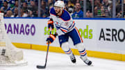 May 16, 2024; Vancouver, British Columbia, CAN; Edmonton Oilers forward Evander Kane (91) handles the puck against the Vancouver Canucks during the third period in game five of the second round of the 2024 Stanley Cup Playoffs at Rogers Arena. Mandatory Credit: Bob Frid-Imagn Images