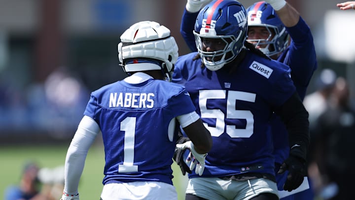 New York Giants wide receiver Malik Nabers celebrates with offensive tackle James Hudson III during training camp New York Giants wide receiver Malik Nabers celebrates with offensive tackle James Hudson III during training camp