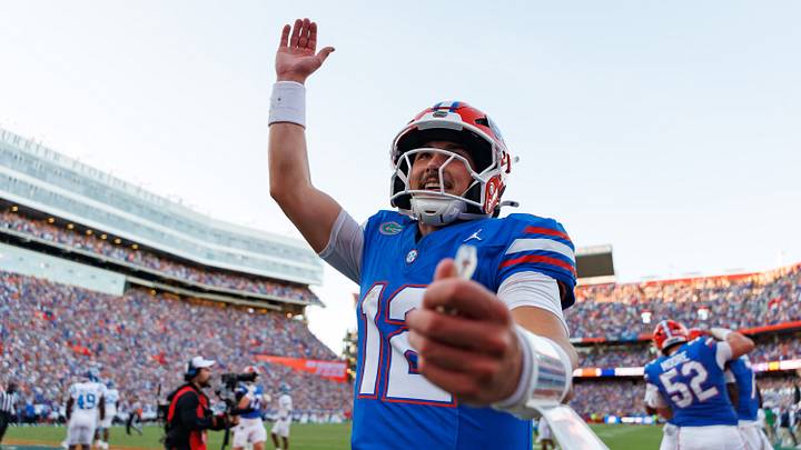 Sep 26, 2026; Gainesville, Florida, USA;  Florida Gators quarterback Aaron Philo (12) gestures after a touchdown against the Mississippi Rebels during the second half at Ben Hill Griffin Stadium.  Mandatory Credit: Matt Pendleton-Imagn Images