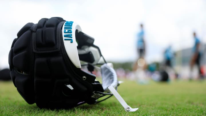 The helmet of Jacksonville Jaguars wide receiver Joshua Cephus (19) lies on the turf during a combined NFL football training camp session between the Tampa Bay Buccaneers and Jacksonville Jaguars Thursday, Aug. 15, 2024 at EverBank Stadium’s Miller Electric Center in Jacksonville, Fla. 