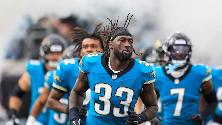 Jacksonville Jaguars linebacker Devin Lloyd (33) runs on the field before an NFL football matchup Sunday, Dec. 15, 2024 at EverBank Stadium in Jacksonville, Fla. [Corey Perrine/Florida Times-Union]
