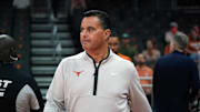 Texas Longhorns head coach Sean Miller enters the court before the game against the Lafayette Leopards at Moody Center.
