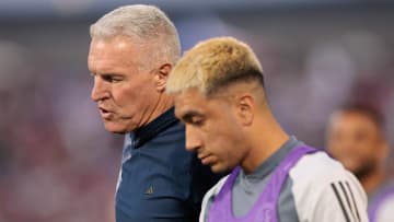 Jul 4, 2024; Commerce City, Colorado, USA; Sporting Kansas City head coach Peter Vermes and midfielder Memo Rodriguez (8) walk off the field after the first half against the Colorado Rapids at Dick's Sporting Goods Park. Mandatory Credit: Andrew Wevers-USA TODAY Sports