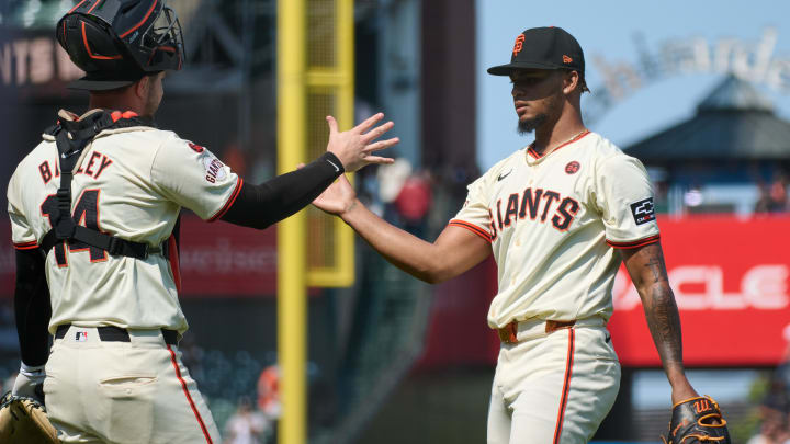 Jul 28, 2024; San Francisco, California, USA; San Francisco Giants pitcher Camilo Doval shakes hands with catcher Patrick Bailey.