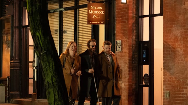 (L-R) Karen Page (Deborah Ann Woll), Daredevil/Matt Murdock (Charlie Cox) and Foggy Nelson (Elden Henson) in Marvel Television's DAREDEVIL: BORN AGAIN, exclusively on Disney+. Photo by Giovanni Rufino. © 2024 MARVEL.