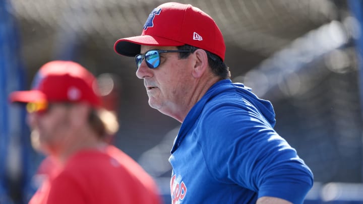 Feb 25, 2024; Clearwater, Florida, USA;  Philadelphia Phillies manager Rob Thomson (59) directs batting practice before a game against the New York Yankees at BayCare Ballpark.