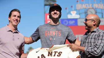 Jul 26, 2023; San Francisco, California, USA; San Francisco Giants general manager Pete Putila, first round draft pick Bryce Eldridge, and president of baseball operations Farhan Zaidi pose for a photo before the game against the Oakland Athletics at Oracle Park. 